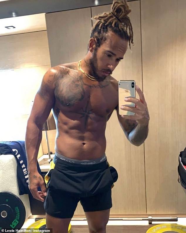 29809342-8439223-_I_can_t_stop_and_I_won_t_Lewis_Hamilton_shows_off_his_ripped_mu-a-35_1592553...jpg