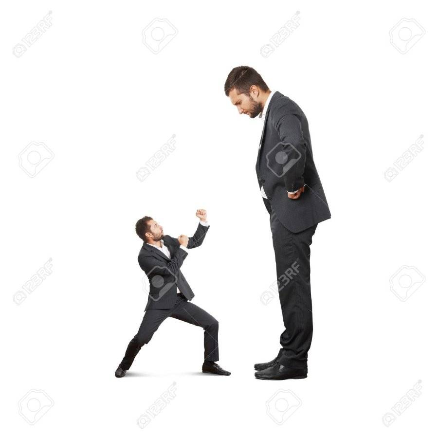 32497174-concept-photo-of-conflict-between-subordinate-and-boss-scared-small-businessman-wavin...jpg