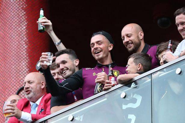 Aston-Villa-s-Jack-Grealish-MOCKS-Birmingham-during-Premier-League-promotion-celebration-16459...jpg
