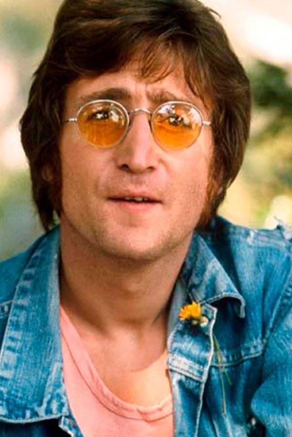 Colour-portrait-of-John-Lennon-in-denim-jacket-and-orange-tinted-round-wire-glasses.jpg