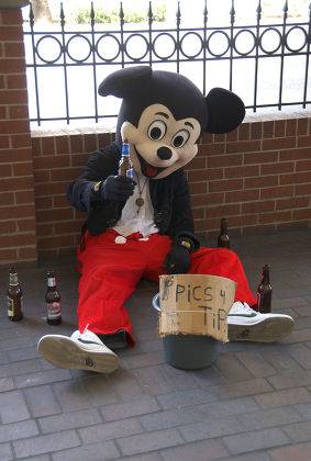 man-dressed-mickey-mouse-drinking-beer-asking-440nw-1686211a.jpg