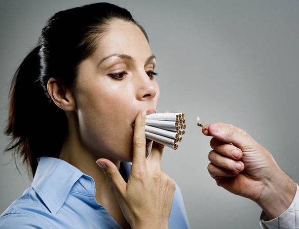 WOMAN-SMOKING-CIGARETT-468910.jpg