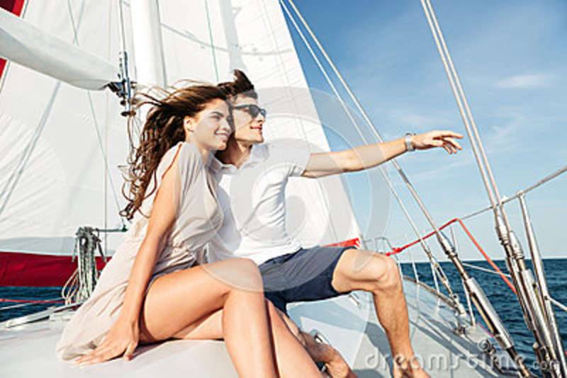 young-beautiful-married-couple-embracing-yacht-vacation-77720289.jpg